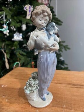 Lladro (My Buddy) Porcelain Boy Figurine in Pale Blue and Cream Holding Puppy